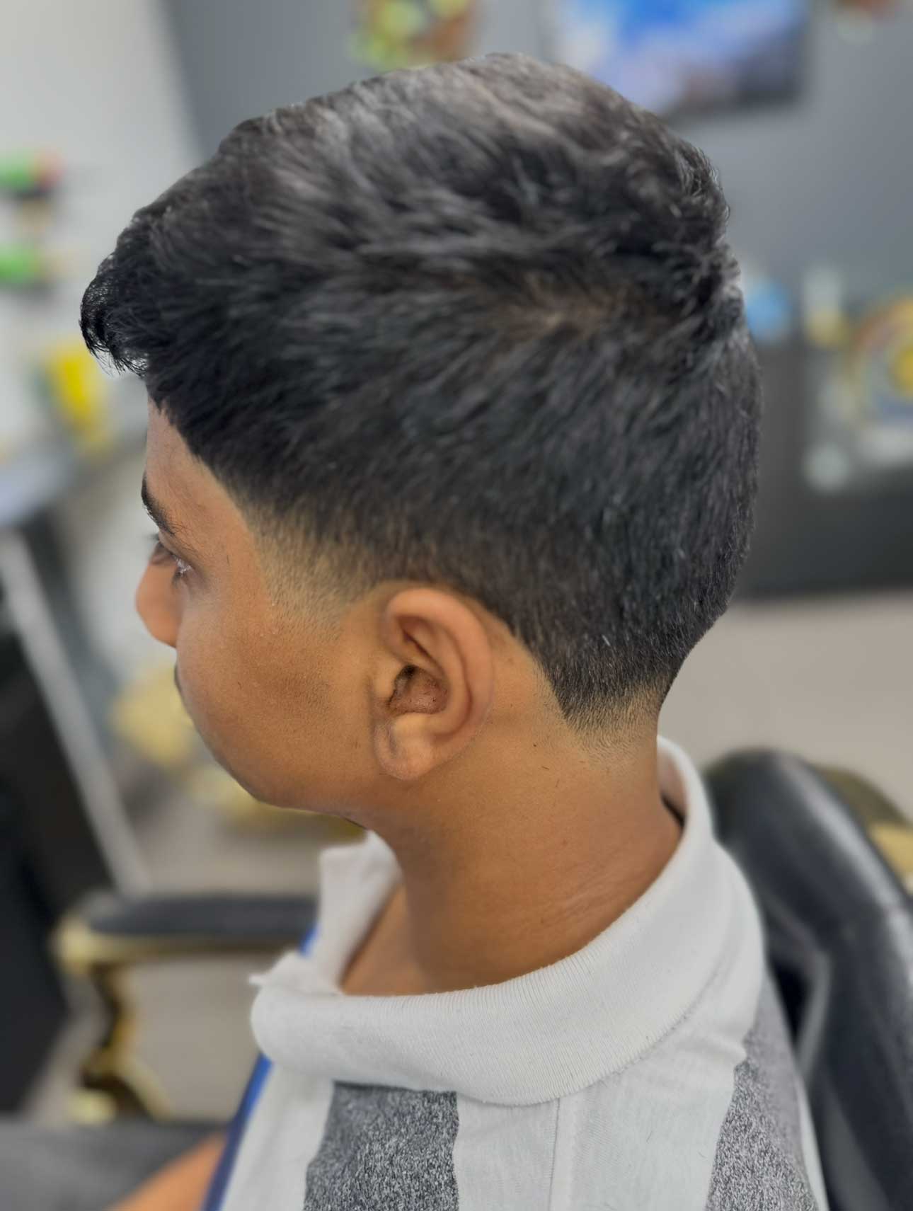 Textured crop with taper fade at Style World Barbers Engadine — precision back and sides